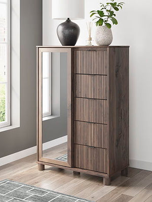 Crafted with both form and function in mind, this dressing chest brings a dash of retro-cool character to your modern boho aesthetic. Reeded accents add an on-trend touch to its classic silhouette. Warmly welcoming with a rich brown finish, the piece pair