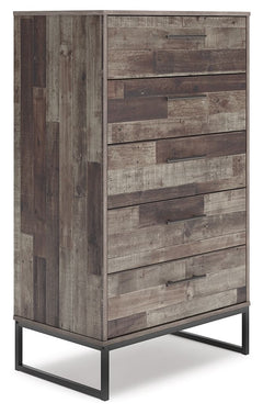 Streamlined design and a stunning finish come together in one simply extraordinary piece. This chest of drawers is sure to impress with five smooth-operating drawers, canted metal legs and a rustic butcher block finish over replicated pine grain texture. 
