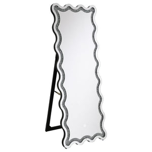 Introduce modern glam sophistication to your bedroom or living area with a contemporary LED floor mirror. It includes a frame that allows it to stand on its own, creating the option for placement anywhere in your space. The mirror boasts a dynamic frame d
