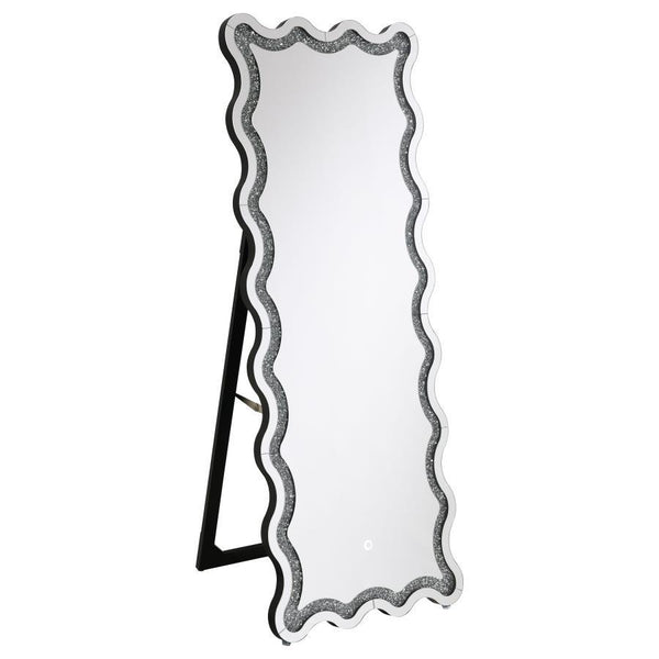 Introduce modern glam sophistication to your bedroom or living area with a contemporary LED floor mirror. It includes a frame that allows it to stand on its own, creating the option for placement anywhere in your space. The mirror boasts a dynamic frame d