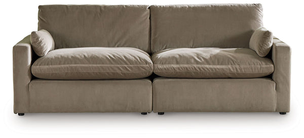 Find yourself inspired by elevated yet functional style. This sectional loveseat balances ultra-soft seating with a clean-cut appearance. Its modular design caters to your needs, whether youâ€™re making space for guests or setting up a cozy family movie n
