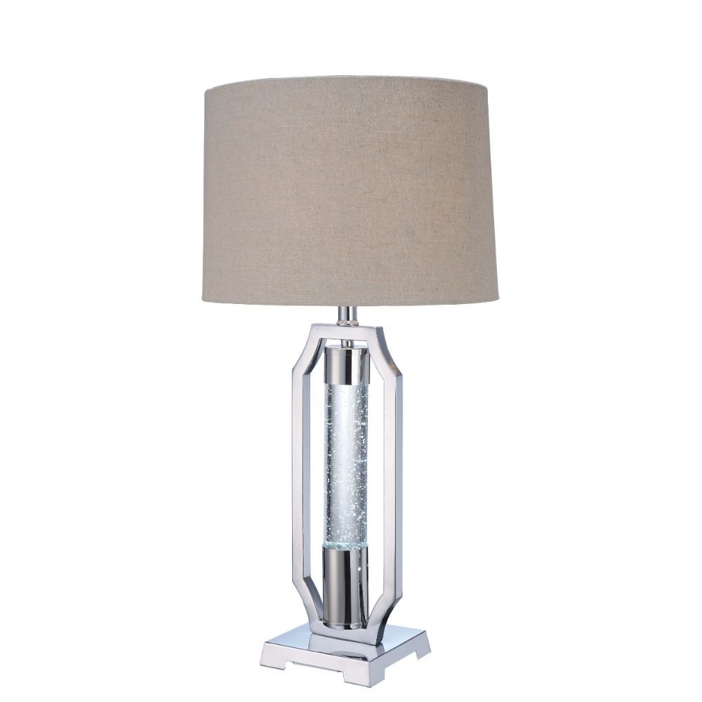 Gleaming and modish, this Cici table lamp will add a hint of luxury to any space. It is crafted in chrome and has light brown fabric drum shade. Featuring metal base with single acrylic cylinder with G9 LED and 4-way rotary switch, the exceptional design 
