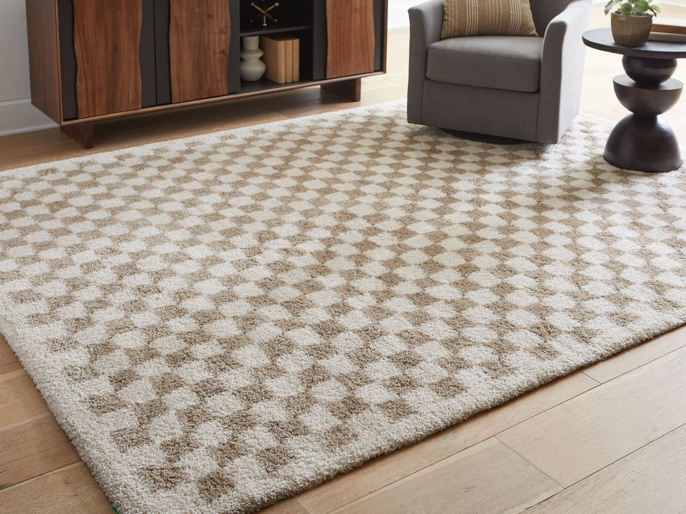 This checkerboard-patterned rug is worth checking out on so many levels. Casually cool and simply striking, its understated neutral palette feels just right everywhere and anywhere. And the ultra-plush shag pile is pure delight.<br/><br/><b>Product Featur