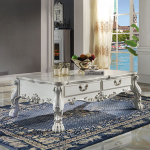 Exclusive DesignStorage: 2 Drawers (Coffee Table Only)Wooden Scalloped Top & Apron with Raised Floral MotifsOversized Claw Legs