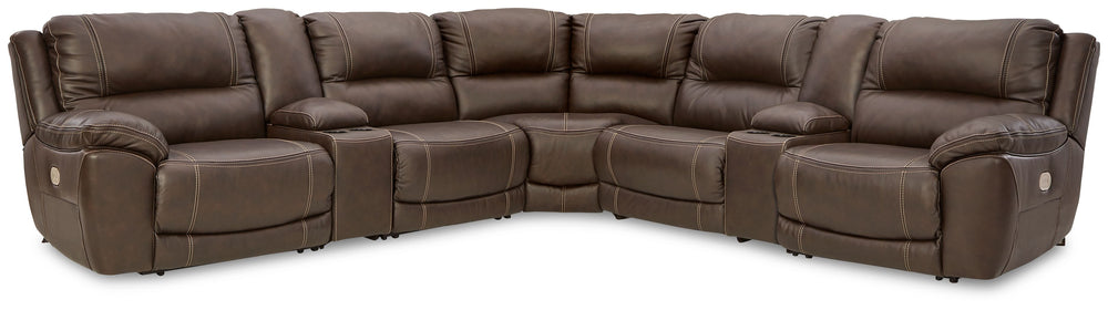Load up on comfort in a cool, clean-lined and contemporary way with this power reclining sectional in chocolate brown. Rest assured, the expertly matched leather and faux leather upholstery is enriched with a pebble grain effect for authentic appeal and e