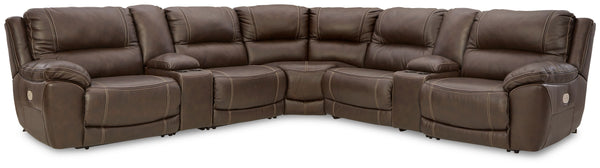 Load up on comfort in a cool, clean-lined and contemporary way with this power reclining sectional in chocolate brown. Rest assured, the expertly matched leather and faux leather upholstery is enriched with a pebble grain effect for authentic appeal and e