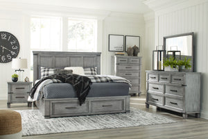  mansion-scale headboard lends a fresh take on a timeless design. The footboard features two storage drawers with