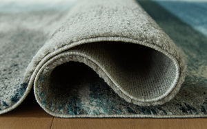  gray and ivory hues come together in luxe harmony. Layer the rug on the floor of your living room or bedroom for an utterly indulgent effect.<br/><b
