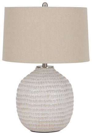 Style and function come together in this textured ceramic lamp to bring incandescent style to any space in your home. Combining a rounded base, accented with goldtone hardware, this lamp is capped off with a simple natural lampshade for complete elegance.