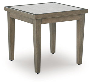 Experience the perfect combination of durability and style with this outdoor end table. An aluminum frame with a wood-look finish maintains a sleek, contemporary aesthetic, while the sintered stone tabletop adds an element of natural elegance. This deligh