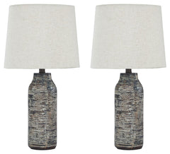 Effortless with a fashionable edge. This table lamp lights your home with urban industrial vibes. A black and white finished paper composite surrounds the base with a worn, textural aesthetic.<br><br><b>Additional Dimensions</b><br><ul><li>Shade: 0-"</li>