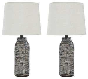 Effortless with a fashionable edge. This table lamp lights your home with urban industrial vibes. A black and white finished paper composite surrounds the base with a worn, textural aesthetic.<br><br><b>Additional Dimensions</b><br><ul><li>Shade: 0-"</li>