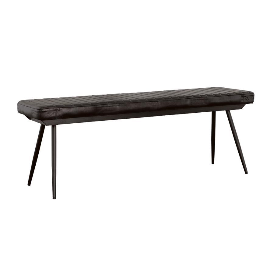Blending rustic charm with industrial appeal, this dining bench is a bold yet versatile seating option. Upholstered in hand-dyed genuine goat leather, the padded seat with vertical tufting offers both comfort and durability. The sleek black metal base, fe