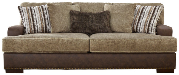 Punctuated by a subtle band of nailhead trim, this sofa is perfect for those who love the look of leather. Two textural tones provide twice the style and comfortâ€”and incorporate an added layer of visual interest. Throw pillows add a fun decorative eleme