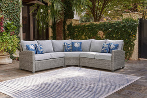 Indulge in backyard bliss. This outdoor sectional has a straightforward sense of style with its light gray resin wicker and wood-look finish. Gray high-performance NuvellaÂ® Premium fabric covers the seat and back cushions, weathering the elements and kee