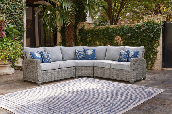 Indulge in backyard bliss. This outdoor sectional has a straightforward sense of style with its light gray resin wicker and wood-look finish. Gray high-performance NuvellaÂ® Premium fabric covers the seat and back cushions, weathering the elements and kee