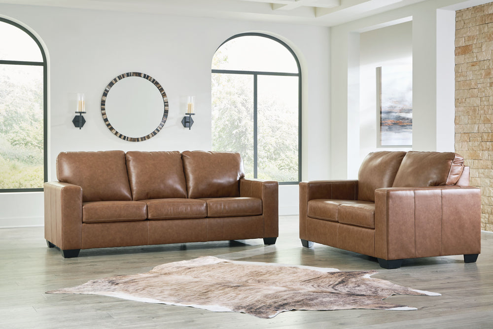 Everyone can have the best seat in the house with this living room set. It-'s wrapped in high-quality combination leather and faux leather upholstery that-'s sure to please. A two-tone effect enhances the depth of color for a uniquely rich appeal. Every i