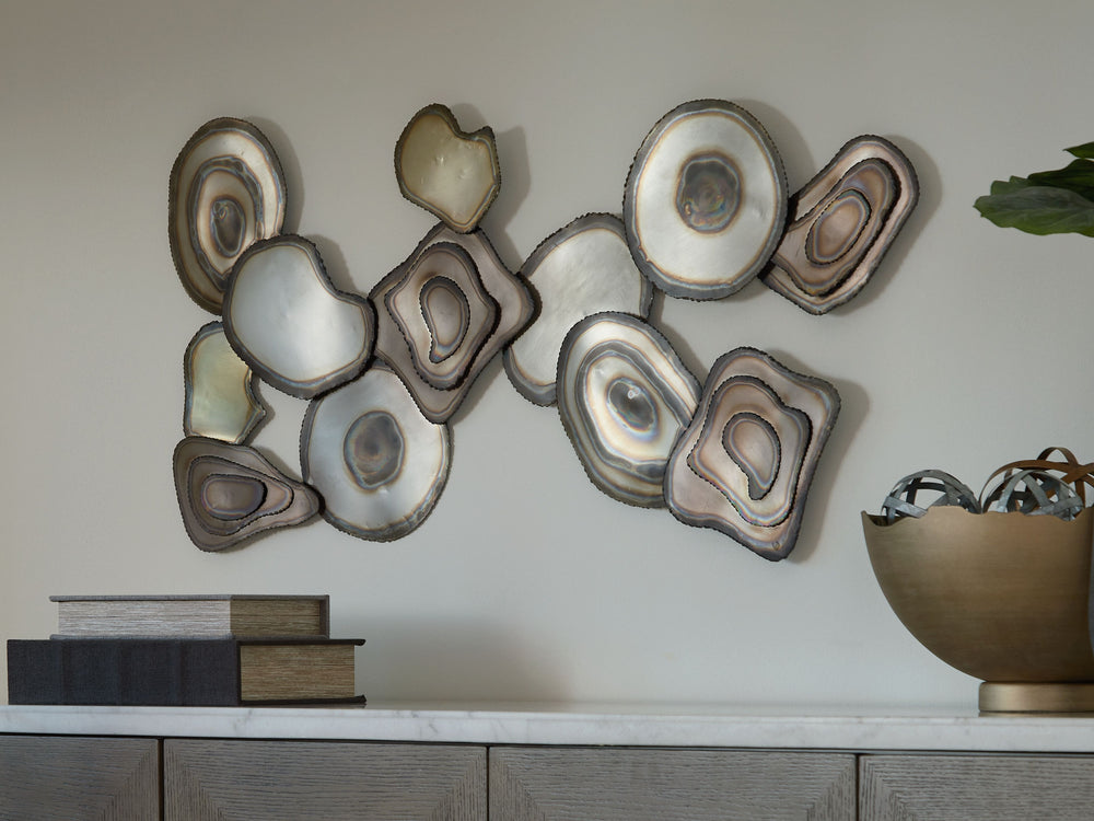 Metallic finishes create an eye-catching interplay of light and dimension in this wall decor. The abstract design and organic shapes lend a sophisticated, contemporary edge, while its ability to hang four ways offers impressive versatility. Whether it-'s 
