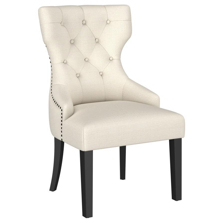 Create an exceptional, inviting dining room space with a modern button tufted dining chair. It pairs a classic wingback profile with a gentle curvature, offering impeccable comfort and chic style. Its plush back and seat feature foam cushioning with soft 