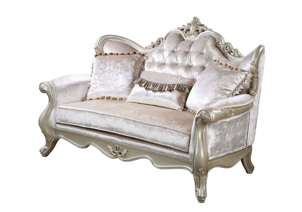 The Monique Royal Classic Loveseat in champagne exemplifies heirloom-quality craftsmanship and timeless elegance. Expertly constructed from premium pine solids and adorned with durable polyurethane carvings, this loveseat is lightweight, moisture-resistan