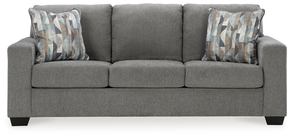 Youâ€™re in for a neat treat with this sofa. Its comfy seats are covered in soft, textural upholstery, and the wide track arms are eager to support your quest for total relaxation. Distressed abstract toss pillows bring a fresh breath of contemporary styl