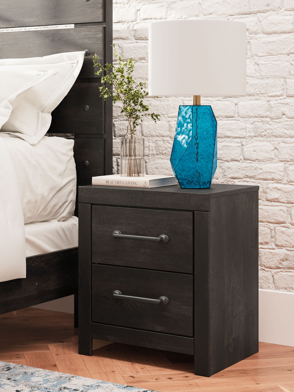 This nightstand puts a casually chic twist on everyday function. Its rustic charcoal finish pairs well with other neutrals and pops of color alike, giving you the flexibility to change up your aesthetic as you please. And with built-in USB charging, you c