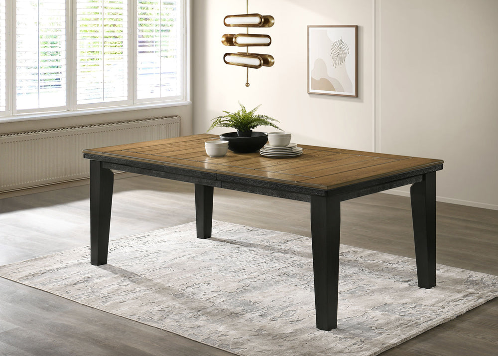 This dining group effortlessly combines farmhouse warmth with modern sophistication, creating a captivating focal point for any dining space. The table features a rich, two-tone design with a beautifully finished wood top and contrasting dark legs, delive