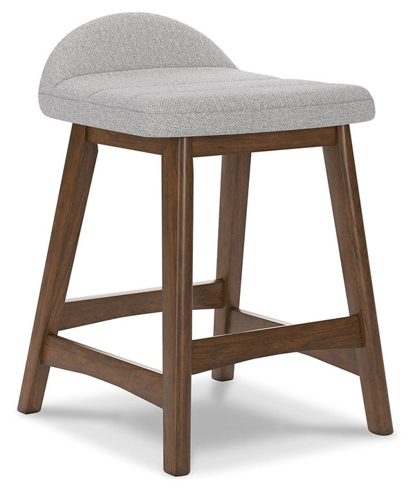 A refreshed take on retro aesthetics. This upholstered bar stool adds an air of playful simplicity to your dining space, capturing the architectural language of mid-century stylings. The seat invites the eye with a soft-edged silhouette and light gray cus