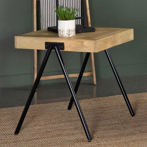  featuring a solid mango wood top in a natural finish to emphasize its unique grain patterns. Supported by black powder-coated iron legs