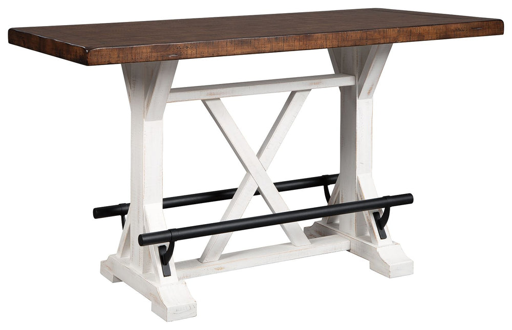 A high-style choice for smaller spaces, this counter height dining table serves up the best in rustic farmhouse living. Its two-tone finish pairs a brown tabletop with a distressed vintage white base for a double helping of charm. Black metal foot rests a