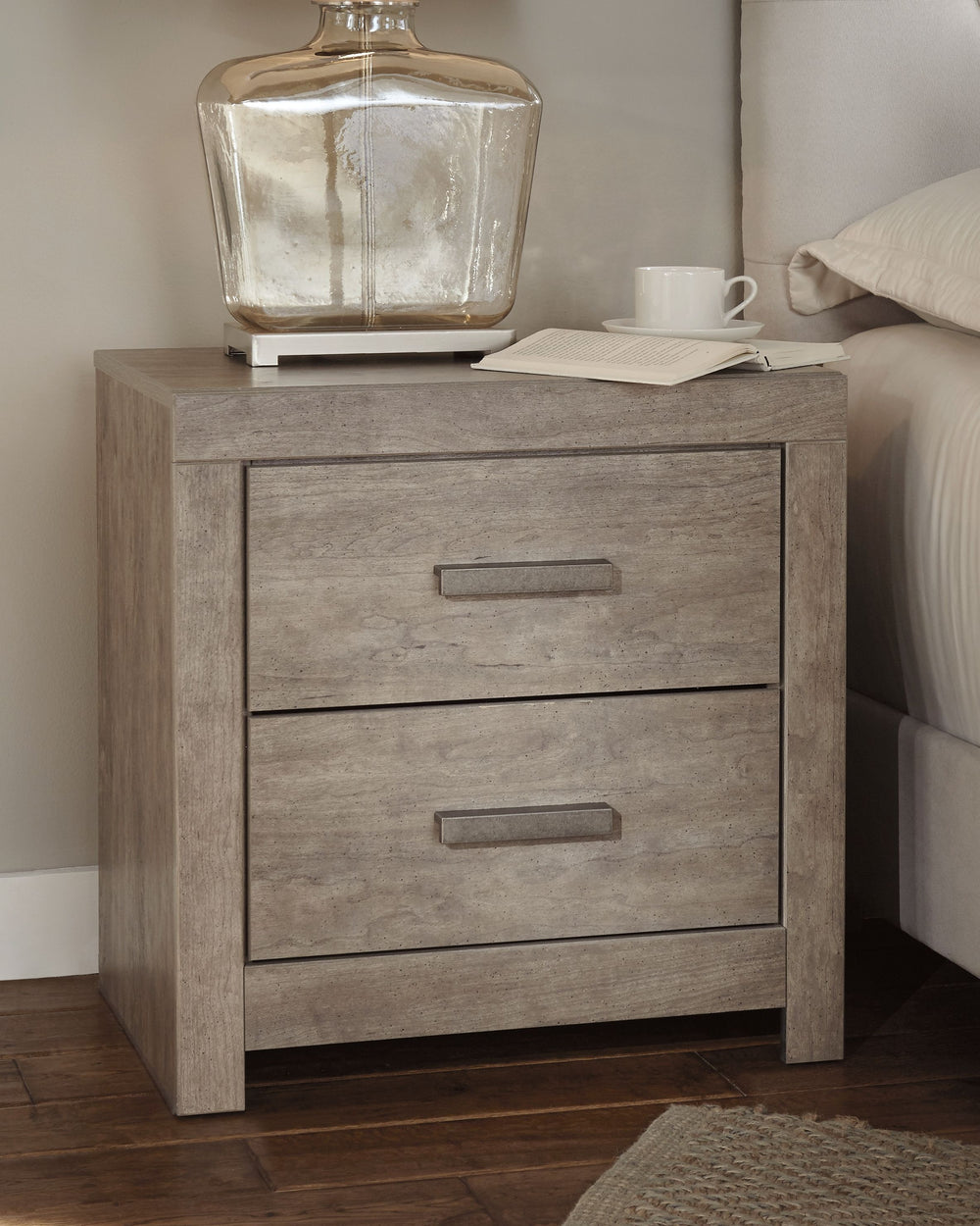 This nightstandâ€™s weathered driftwood finish evokes such an ethereal vibeâ€”exactly what you need for your serene master suite. Clean lines and simple yet substantial hardware make for a timeless look youâ€™ll love living with for years to come. Two spa