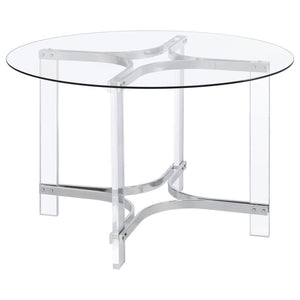 Center your dining experience on a chic, modern round dining table with sculptural appeal. It boasts four straight clear acrylic legs with four-point star bases that create incredible stability. The gleaming chrome finish stands out, adding artistry to yo