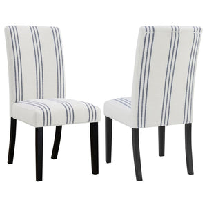 This dining chair blends casual elegance with functional comfort, making it a versatile addition to dining spaces. Upholstered in a linen-like beige fabric with subtle blue stripes, it adds a relaxed yet refined aesthetic. The chair features a padded seat