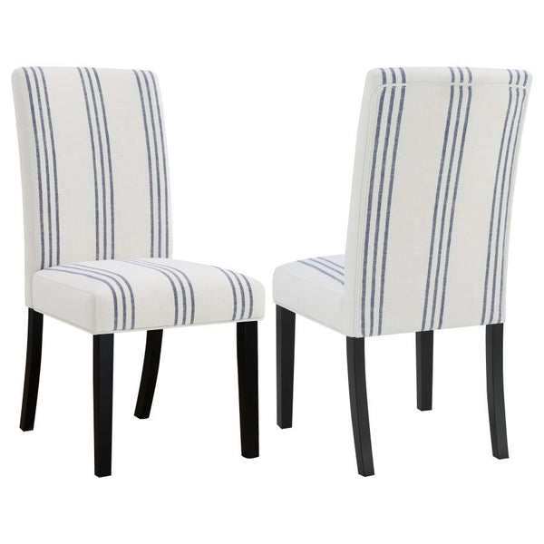 This dining chair blends casual elegance with functional comfort, making it a versatile addition to dining spaces. Upholstered in a linen-like beige fabric with subtle blue stripes, it adds a relaxed yet refined aesthetic. The chair features a padded seat