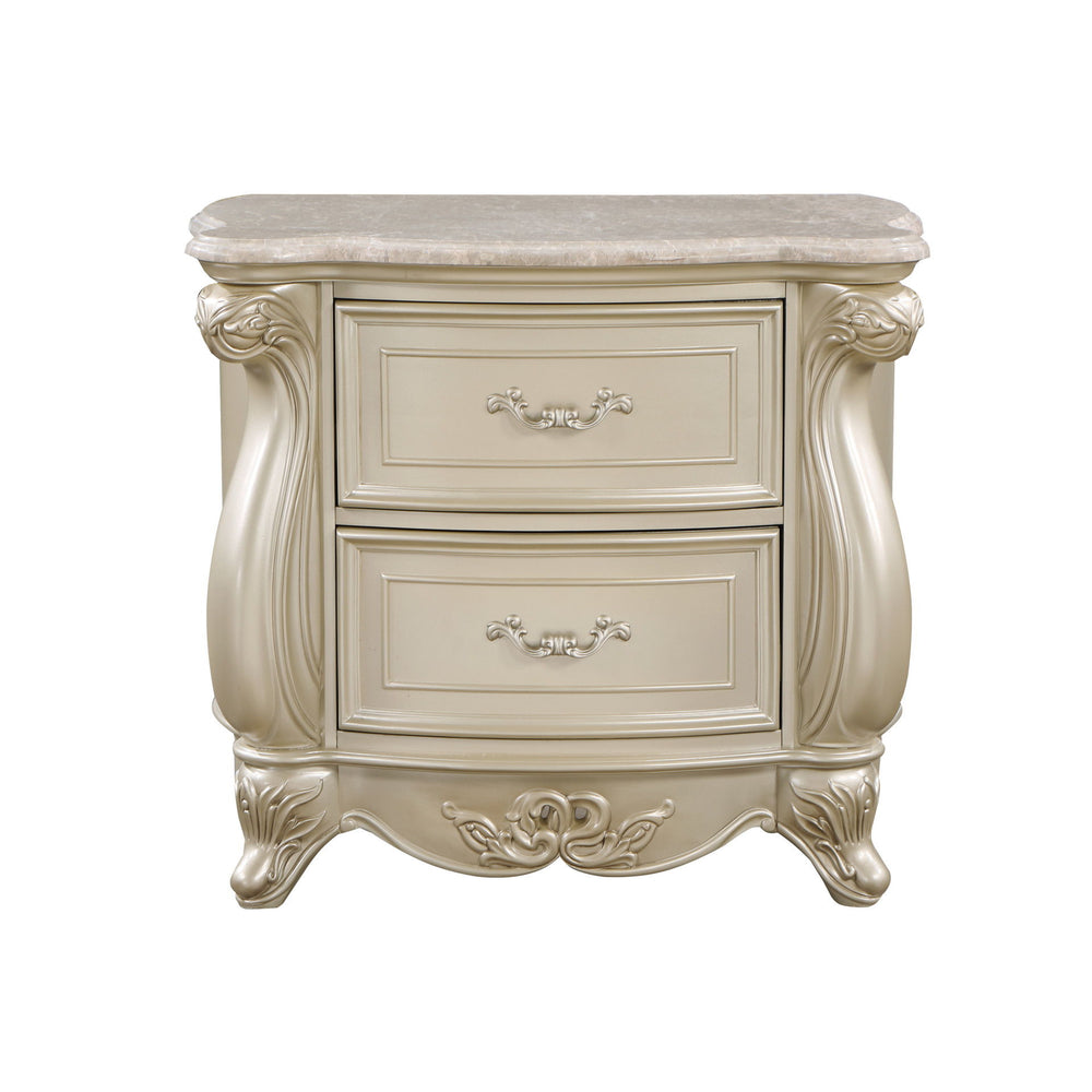 The Monique Marble Top 2 Drawer Nightstand in Champagne combines heirloom quality construction with French Provincial elegance. Crafted with poplar solids and birch veneers, this nightstand ensures strength and durability. Reflecting the charm and sophist