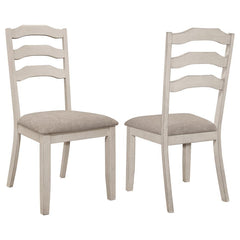 Enhance the cozy atmosphere of your dining space with our modern farmhouse and coastal cottage dining side chairs. These ladder back chairs exude a charming rustic appeal with their distressed cream finish on the legs and back. The khaki polyester fabric 