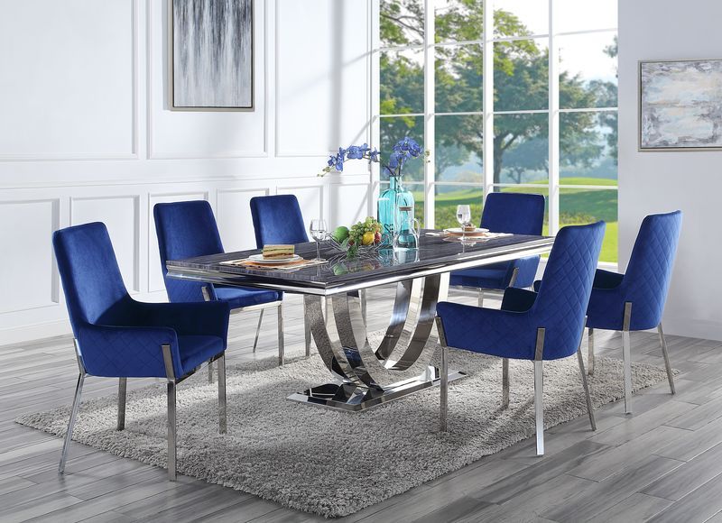 Update your dining space with the Cambrie dining collection. The table features an eye-catching metal geometric pedestal base that is sure to leave your dinner guests impressed. The ample faux marble tabletop adds more visual interest to the piece. The ma