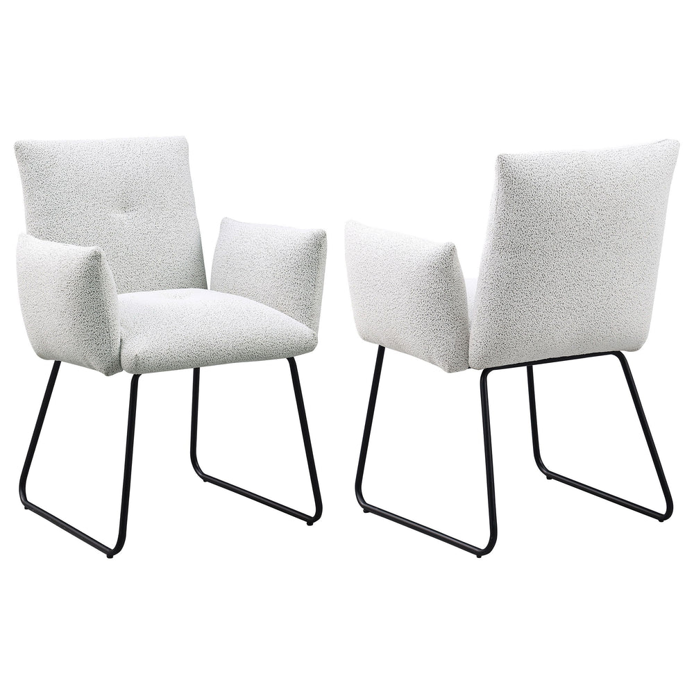 Elevate your dining experience with this modern dining chair, designed for both comfort and style. Upholstered in soft fabric, this chair provides a cozy seat for everyday dining or special gatherings. The chair features a contemporary design with gently 