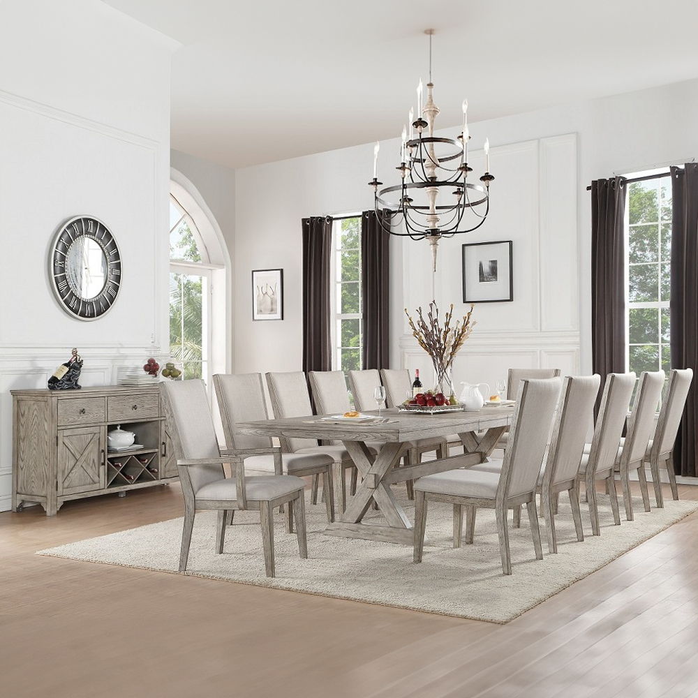 This Rocky dining collection will be an ideal set for any dining room. Featuring in gray oak finish, the dining table with trestle base and its matching chair create a rustic style look to your dining space. A matching server with wine rack is also availa