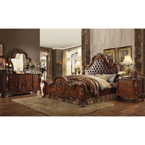 Elegant yet lightheartedly playful, Dresden is donned in an amiable cherry oak finish with hand applied burnish over the many layers of stains and finishes that are manually rubbed on, providing depth and character to this classic group. The Rococo style 