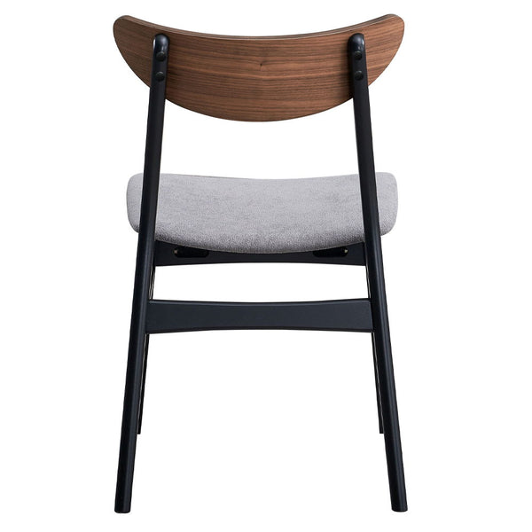  while the black legs provide a modern contrast. Perfect for family dinners or entertaining gue