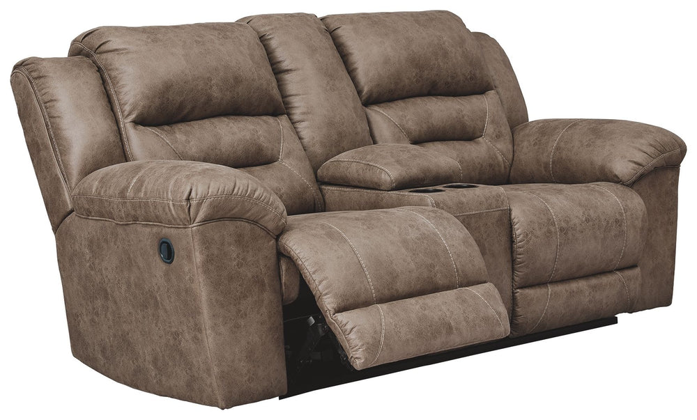 For those who love the cool look of leather but long for the warm feel of fabric, this reclining loveseat delivers both with ease. Its high-performance padded faux leather is remarkably durable and easy to clean, making it just the thing for family spaces