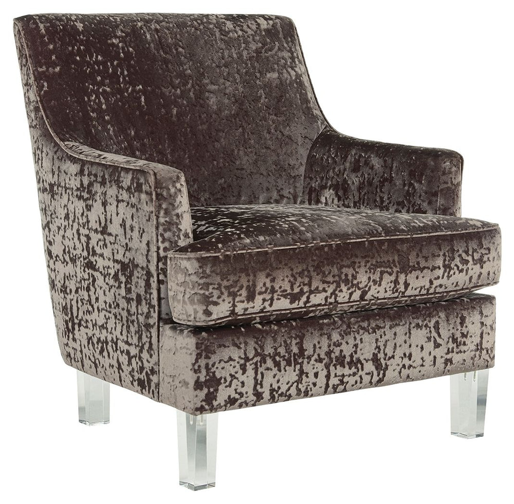 This accent chair with shelter arm styling merges contemporary and traditional styling in the most beautiful way. The combination of polyester crushed velvet upholstery and tapered clear acrylic legs makes for one cool contrast. Combining comfort and fash