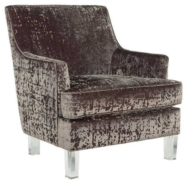 This accent chair with shelter arm styling merges contemporary and traditional styling in the most beautiful way. The combination of polyester crushed velvet upholstery and tapered clear acrylic legs makes for one cool contrast. Combining comfort and fash