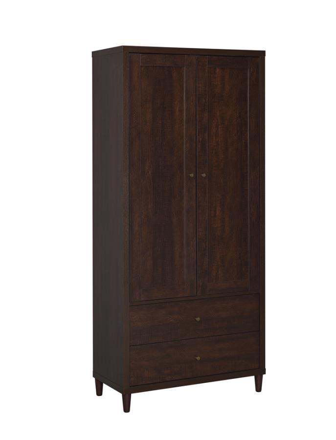 This impressive accent cabinet imparts an imposing presence to the home. At over six feet tall, it has the capacity to take on all storage needs. Two doors open up to ample space. Below are two deep drawers for additional storage of everything from sofa c