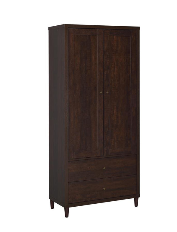This impressive accent cabinet imparts an imposing presence to the home. At over six feet tall, it has the capacity to take on all storage needs. Two doors open up to ample space. Below are two deep drawers for additional storage of everything from sofa c