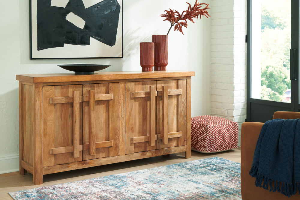 Say hello to style and bid farewell to clutter without compromising on design. This accent cabinet radiates refined modern craftsman influence. Impressive detailing and cabinets with dynamic oversized wooden pulls create organic appeal. Offering ample sto