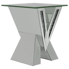 This mirrored end table brings a bold, artistic flair to any living space. Its striking V-shaped base features mirrored panels and glittering crystal accents, creating a glamorous and reflective design. Topped with a square, beveled tempered glass surface