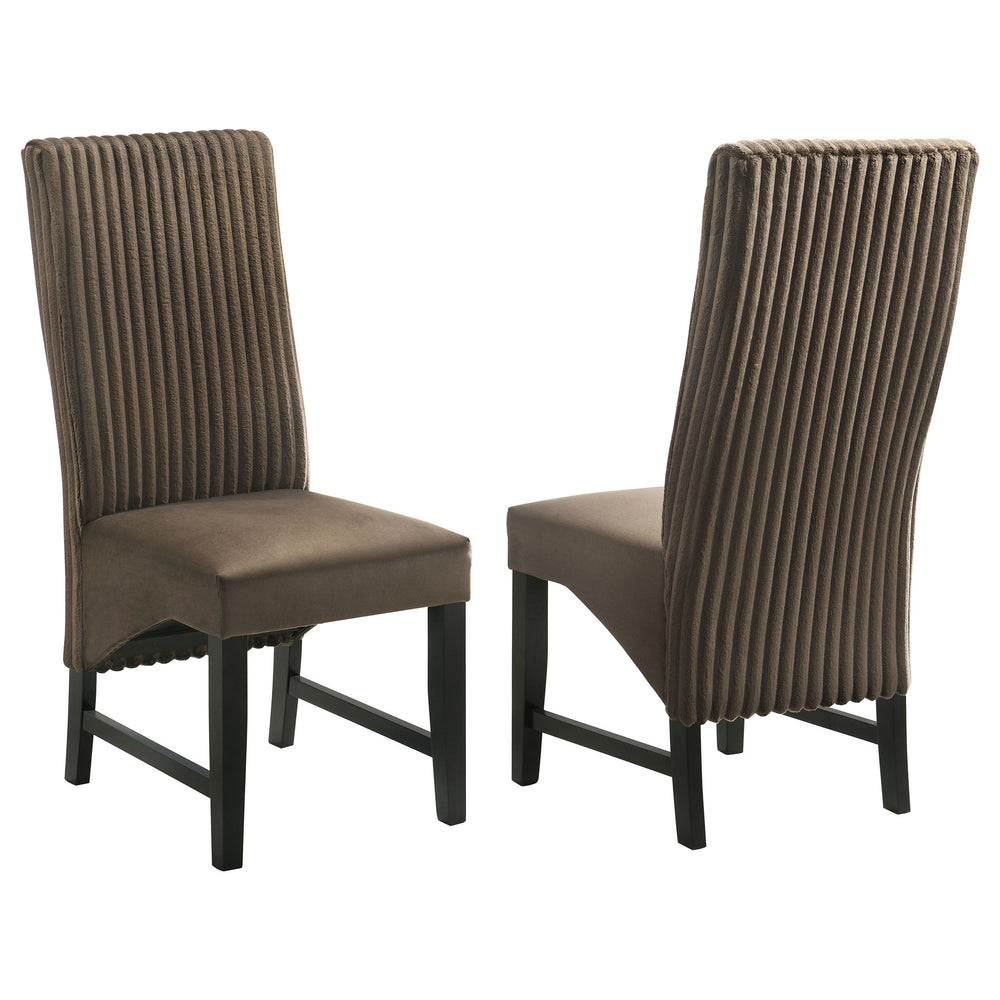 Elevate your dining space with these sophisticated dining chairs, blending textures and luxurious fabrics for a modern, elegant look. The seat back features wide channel corduroy upholstery, adding rich texture and a stylish visual contrast. The seat itse