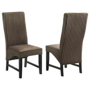 Elevate your dining space with these sophisticated dining chairs, blending textures and luxurious fabrics for a modern, elegant look. The seat back features wide channel corduroy upholstery, adding rich texture and a stylish visual contrast. The seat itse